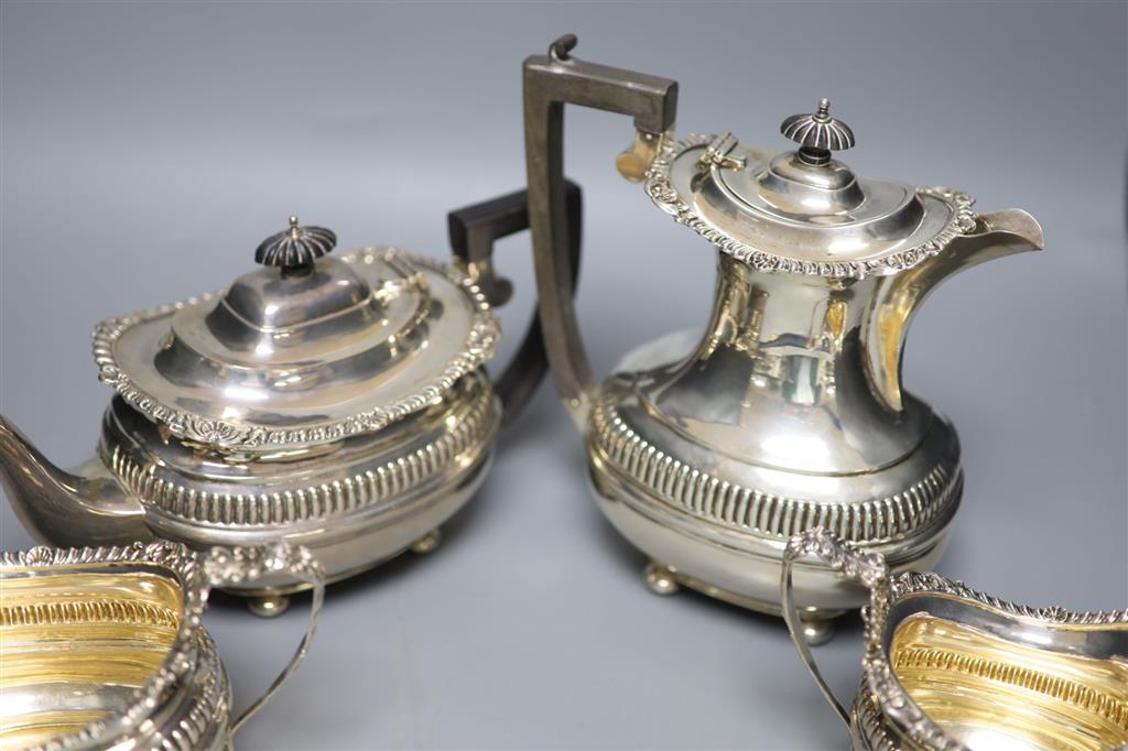 A silver four-piece tea service, London shape, George Nathan & Ridley Hayes, Chester 1907, 1911 & 1912, gross 57.84oz.